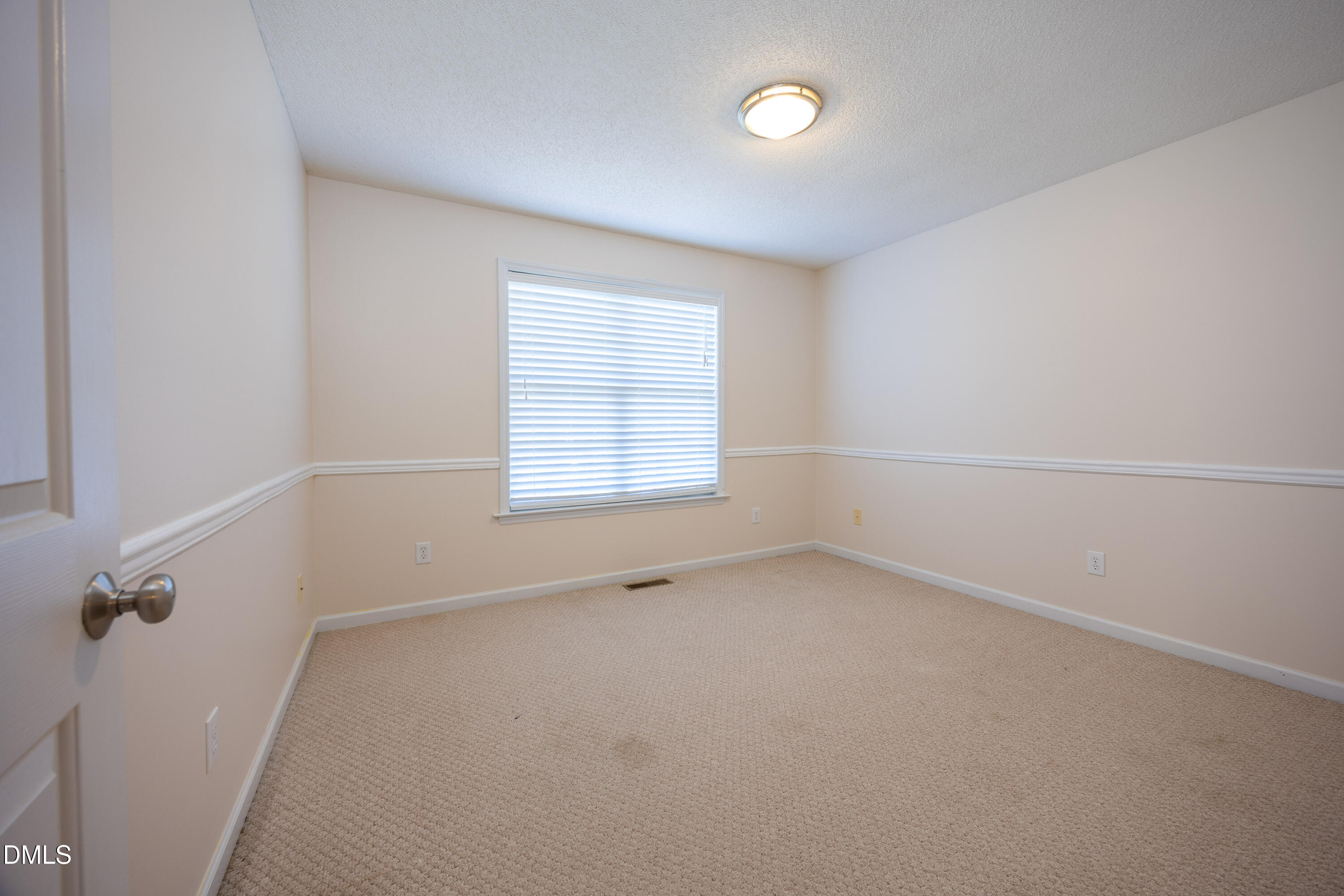 120 Line Drive Raleigh, NC 27603 - Photo 25 of 36 an empty room with a window