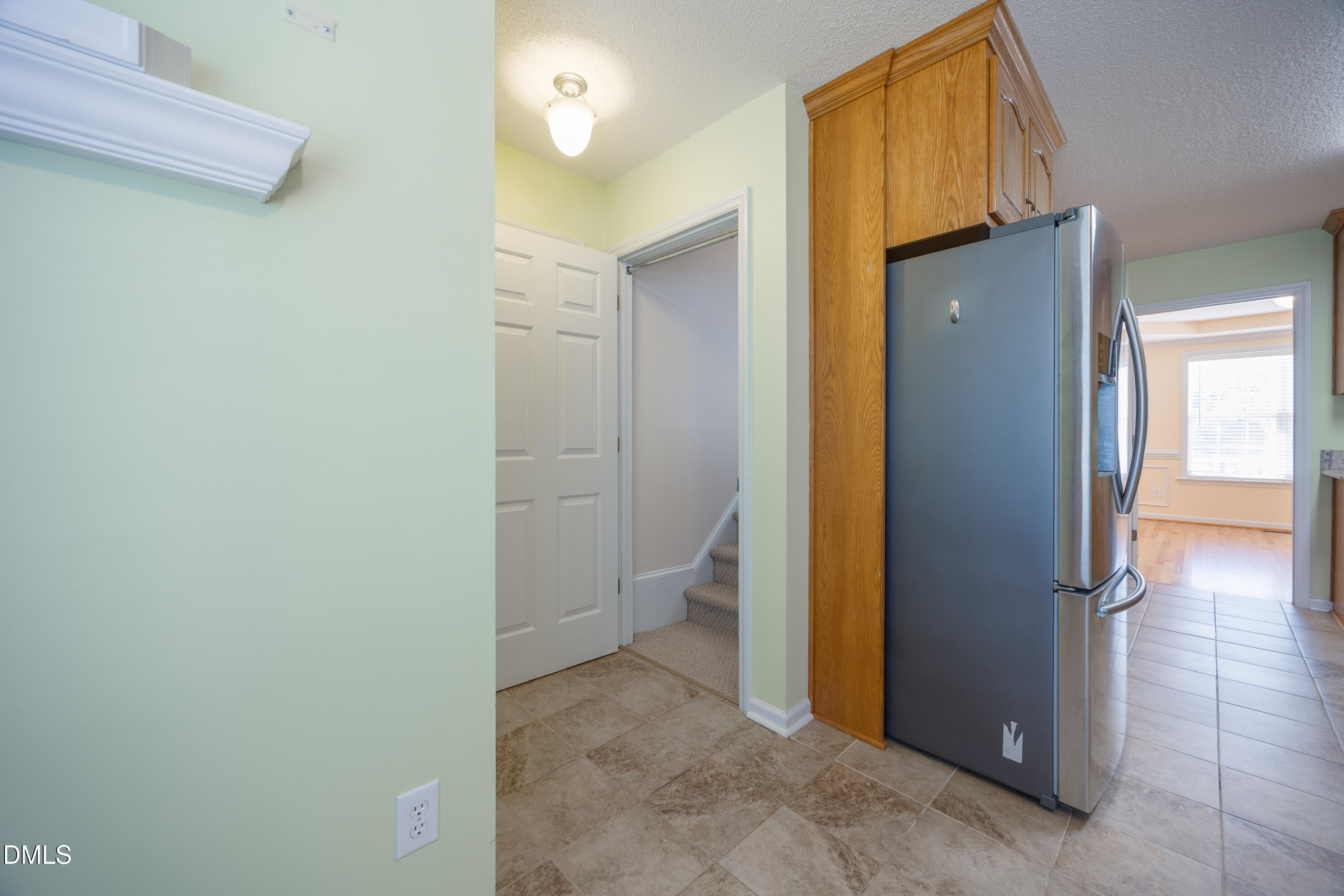 120 Line Drive Raleigh, NC 27603 - Photo 28 of 36 a view of a bathroom with a refrigerator and a sink