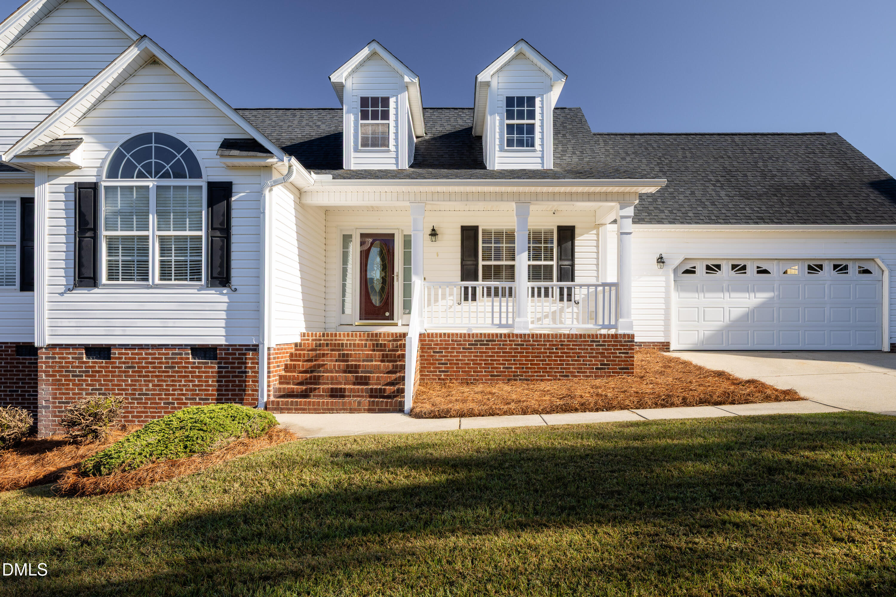 120 Line Drive Raleigh, NC 27603 - Photo 3 of 36 a front view of a house with a yard