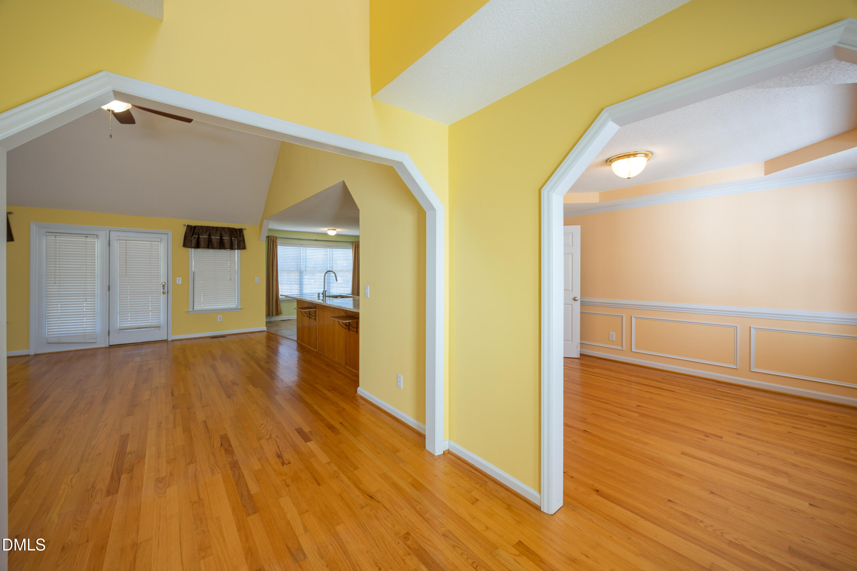 120 Line Drive Raleigh, NC 27603 - Photo 5 of 36 a view of a big room with wooden floor and windows
