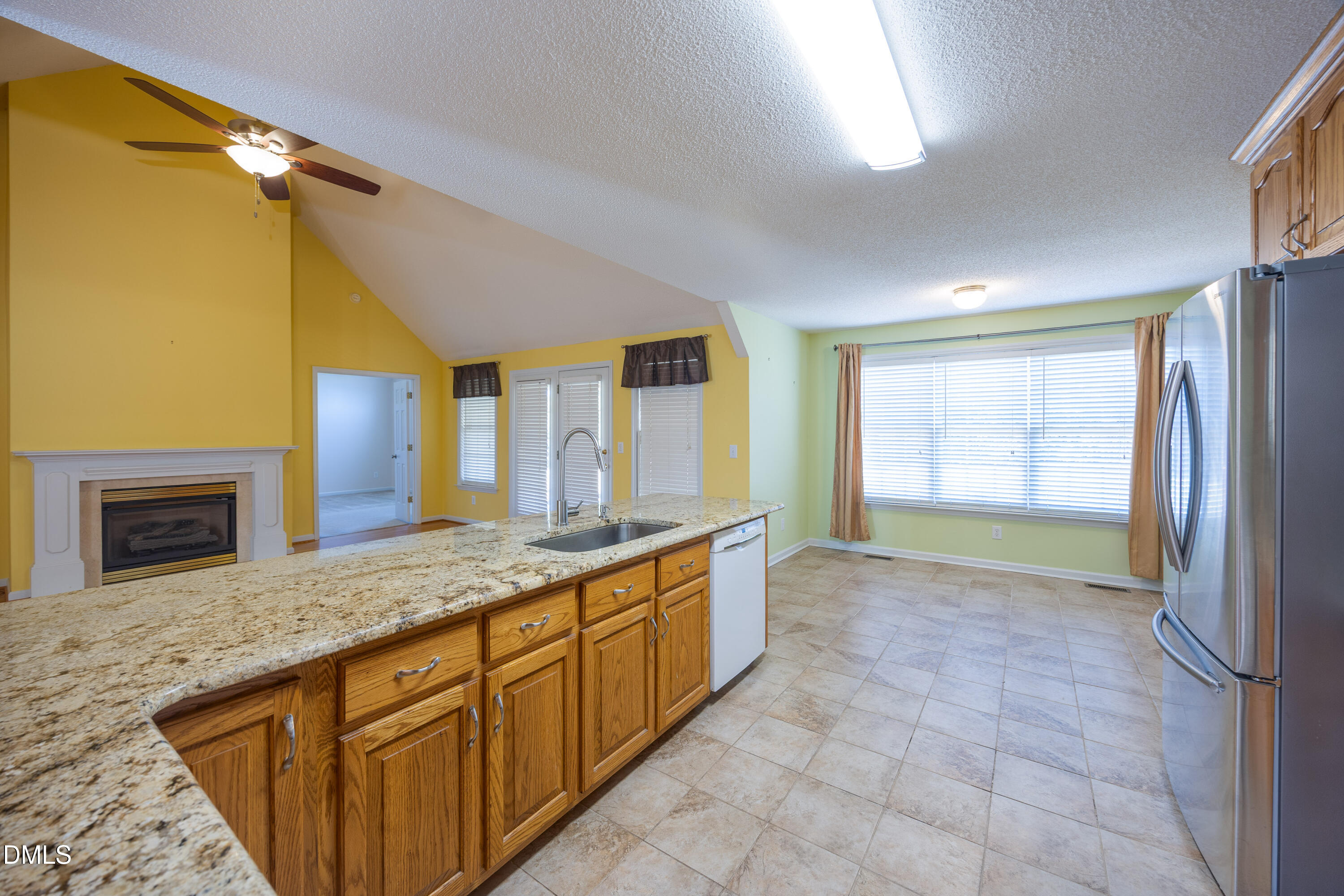 120 Line Drive Raleigh, NC 27603 - Photo 10 of 36 a spacious bathroom with a granite countertop sink a mirror and a bathtub