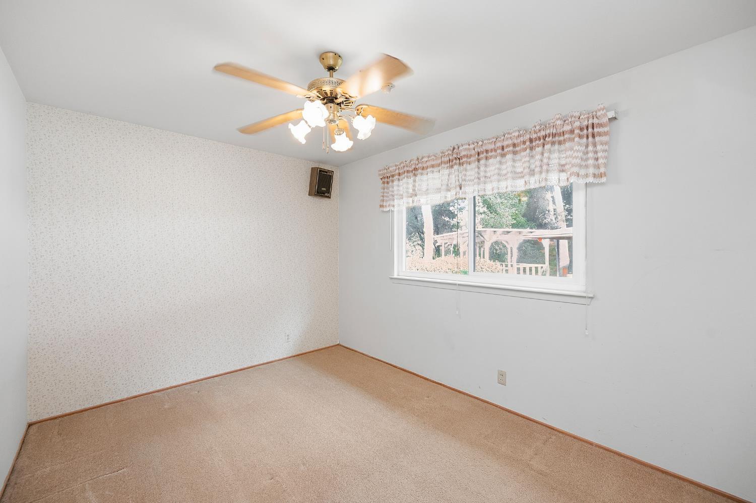7349 Green Valley Road Placerville, CA 95667 - Photo 26 of 41 Bedroom 2. Large dual pane window to back.