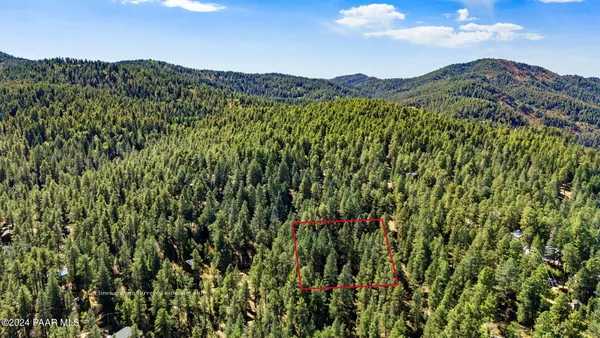 a view of a city with a mountain in the background