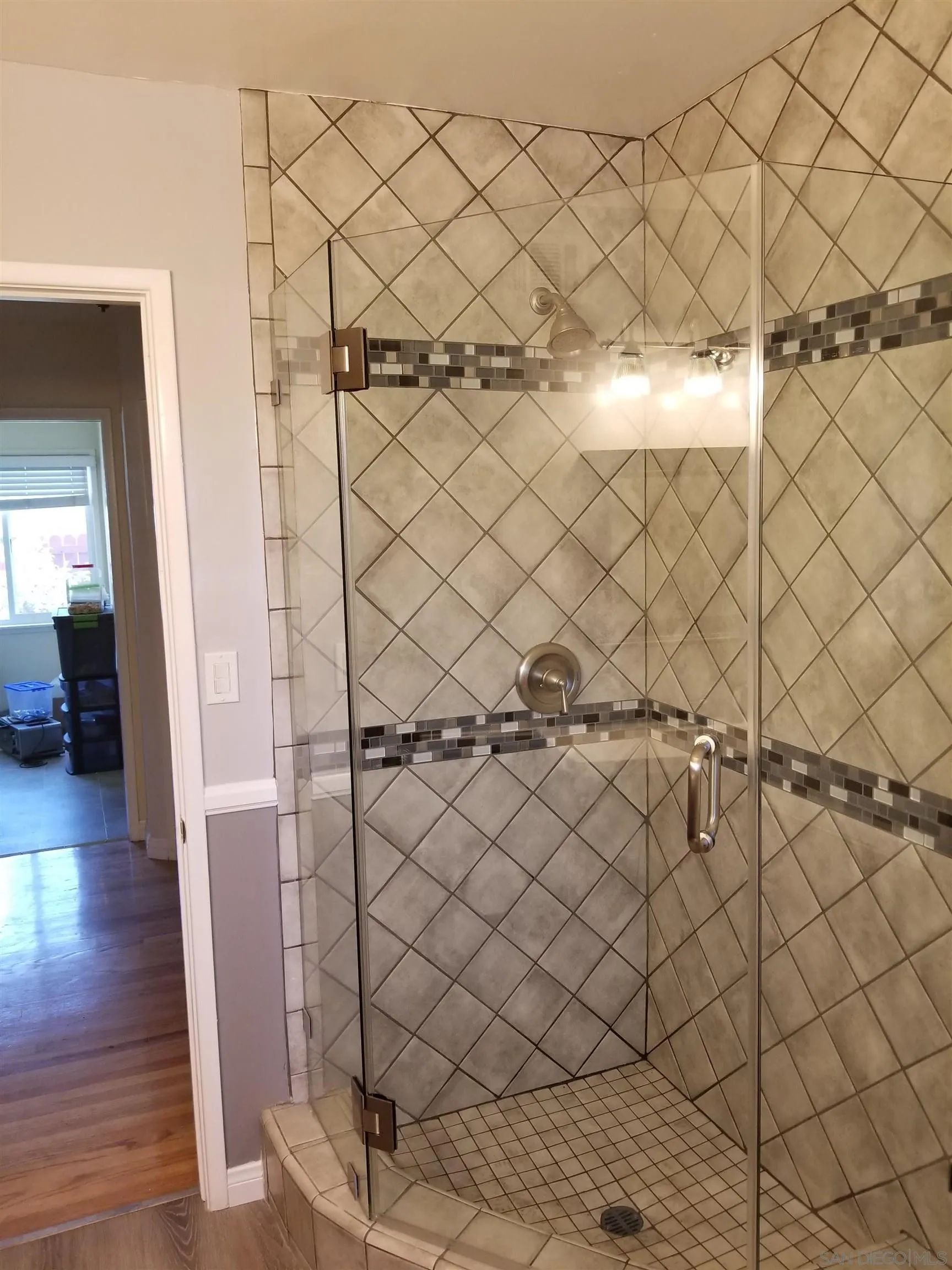 5051 63rd Street San Diego, CA 92115 - Photo 12 of 28 a view of a wooden floor