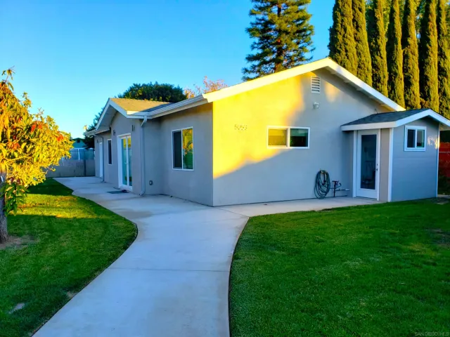 a house view with a garden space