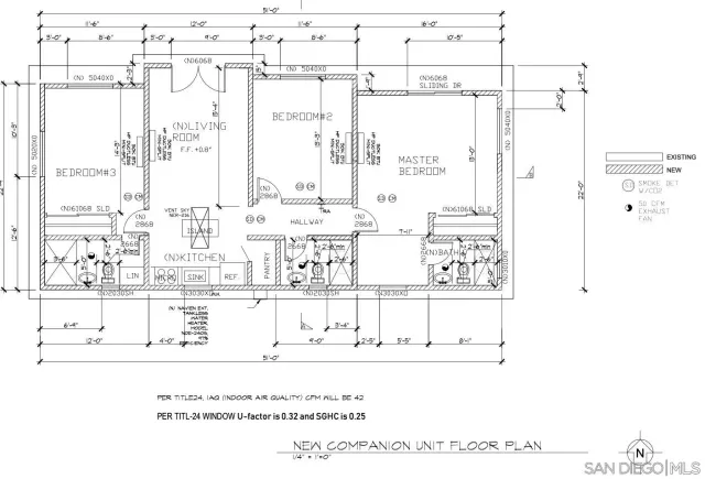 a black and white photo of a living room