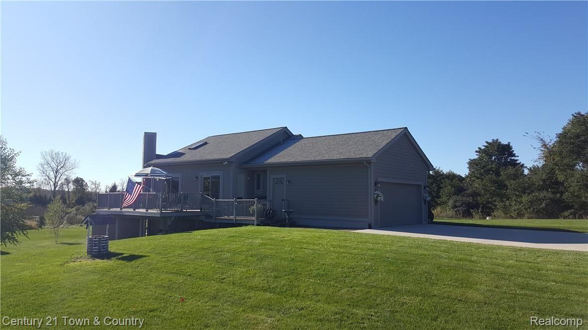 3628 Lake George Road Leonard, MI 48367 - Photo 36 of 39 Rear View of Home