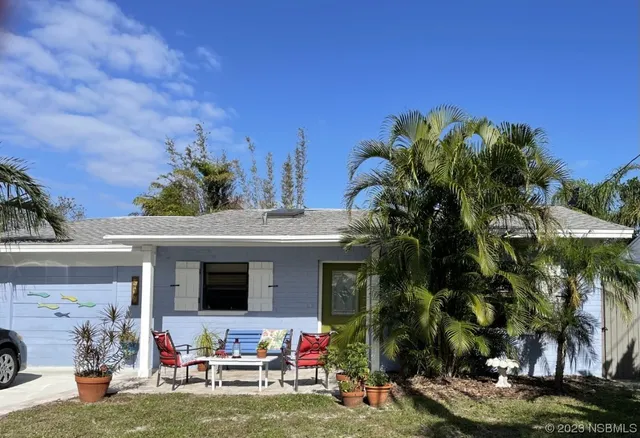 a view of a house with a patio