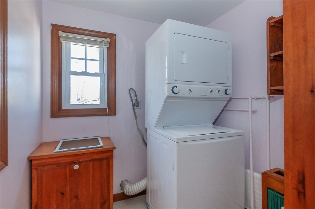 7 Roosevelt Street Wareham, MA 02571 - Photo 16 of 29 a utility room with dryer and washer