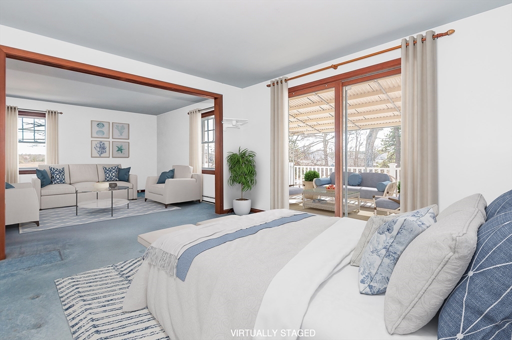 7 Roosevelt Street Wareham, MA 02571 - Photo 20 of 29 a bedroom with bed and large windows with outer view