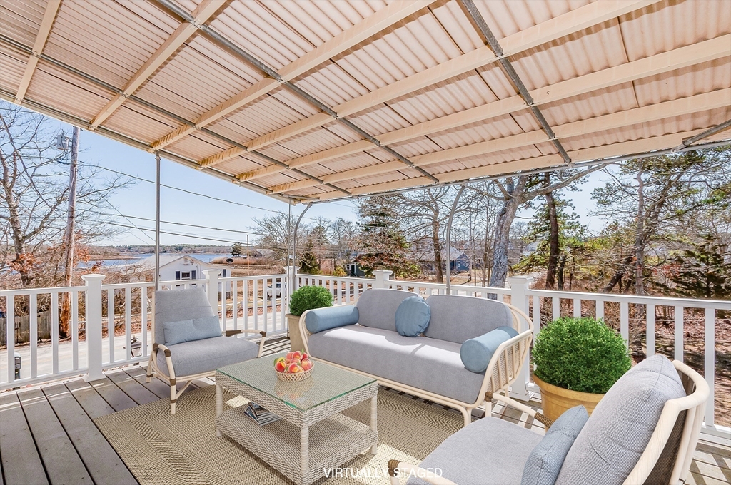 7 Roosevelt Street Wareham, MA 02571 - Photo 23 of 29 a outdoor living space with patio furniture and garden view