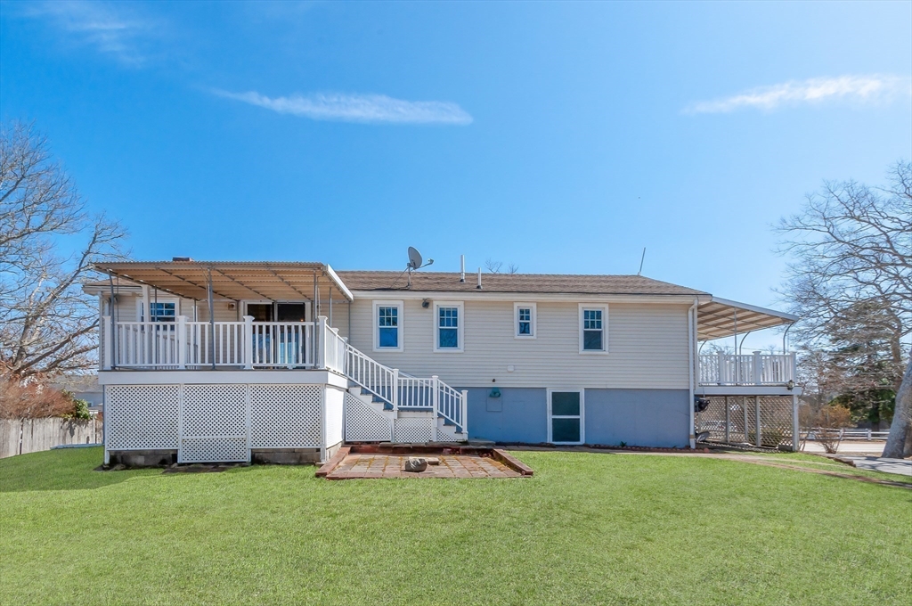 7 Roosevelt Street Wareham, MA 02571 - Photo 26 of 29 a view of house with a big yard