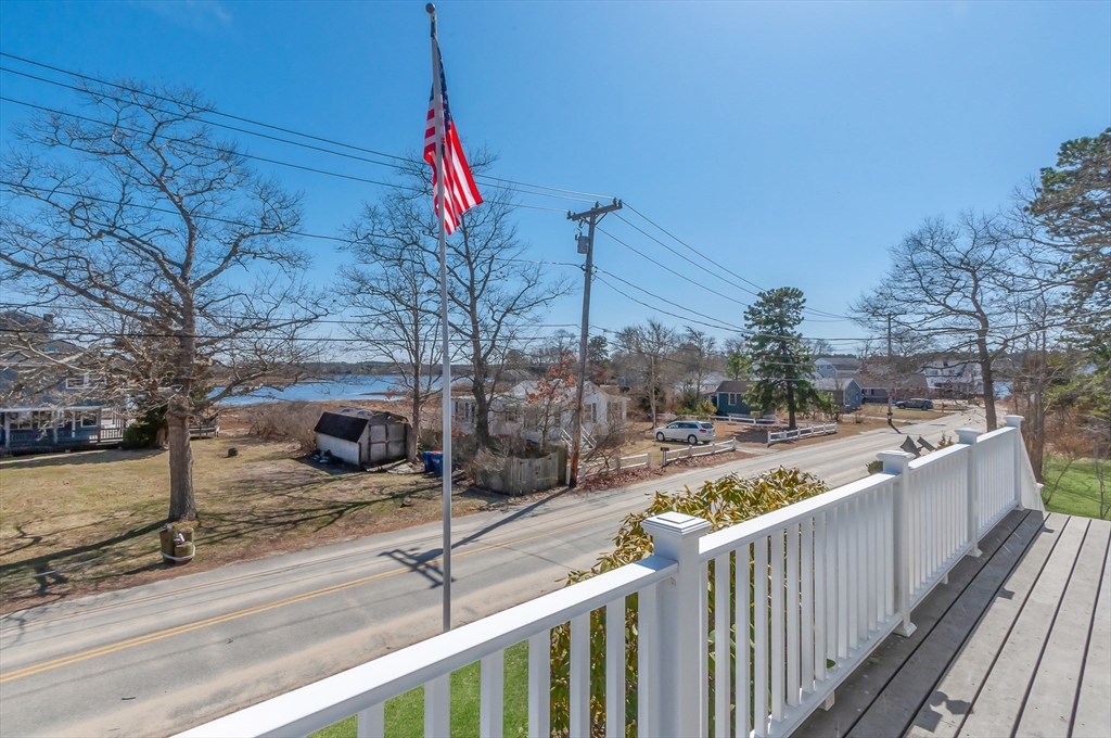 7 Roosevelt Street Wareham, MA 02571 - Photo 3 of 29 a view of a house with a wooden fence