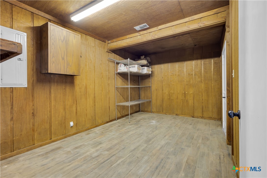 12491 Madison Lane Justin, TX 76247 - Photo 37 of 38 a view of a room with wooden walls