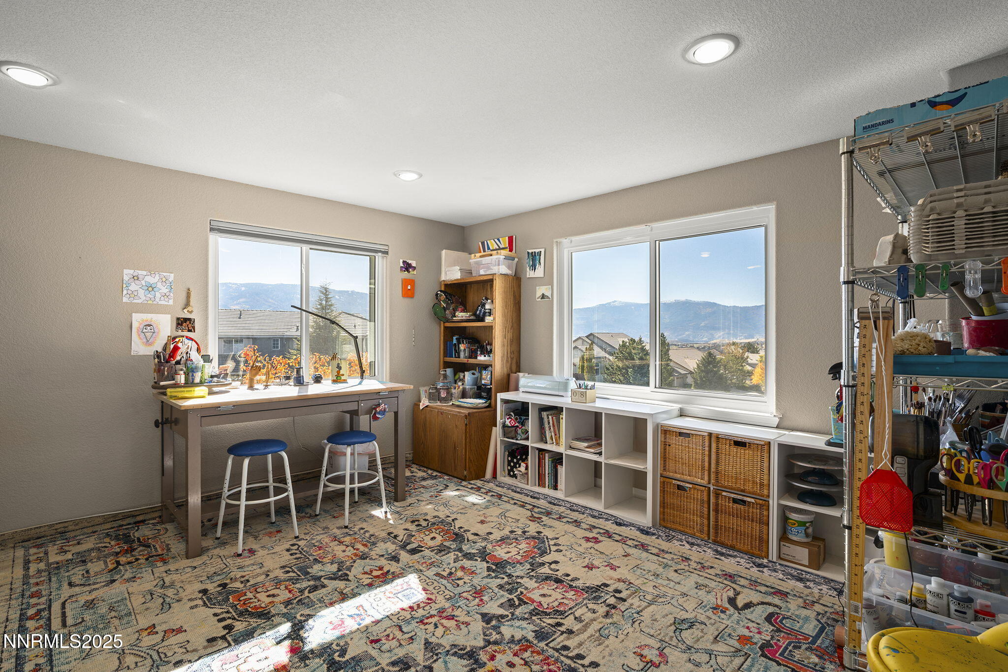 7159 Windstar Drive Reno, NV 89523 - Photo 21 of 33 a room with furniture a rug and a window