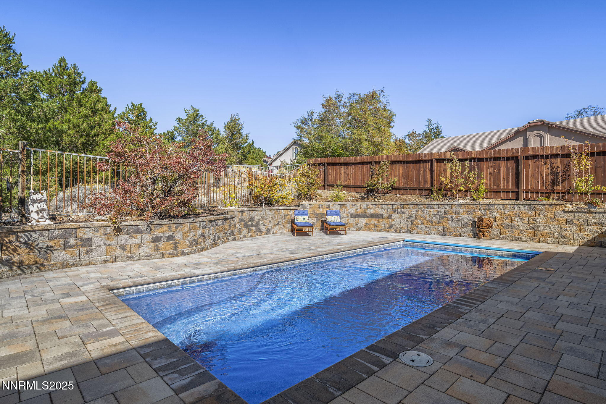 7159 Windstar Drive Reno, NV 89523 - Photo 25 of 33 a view of a swimming pool with a patio