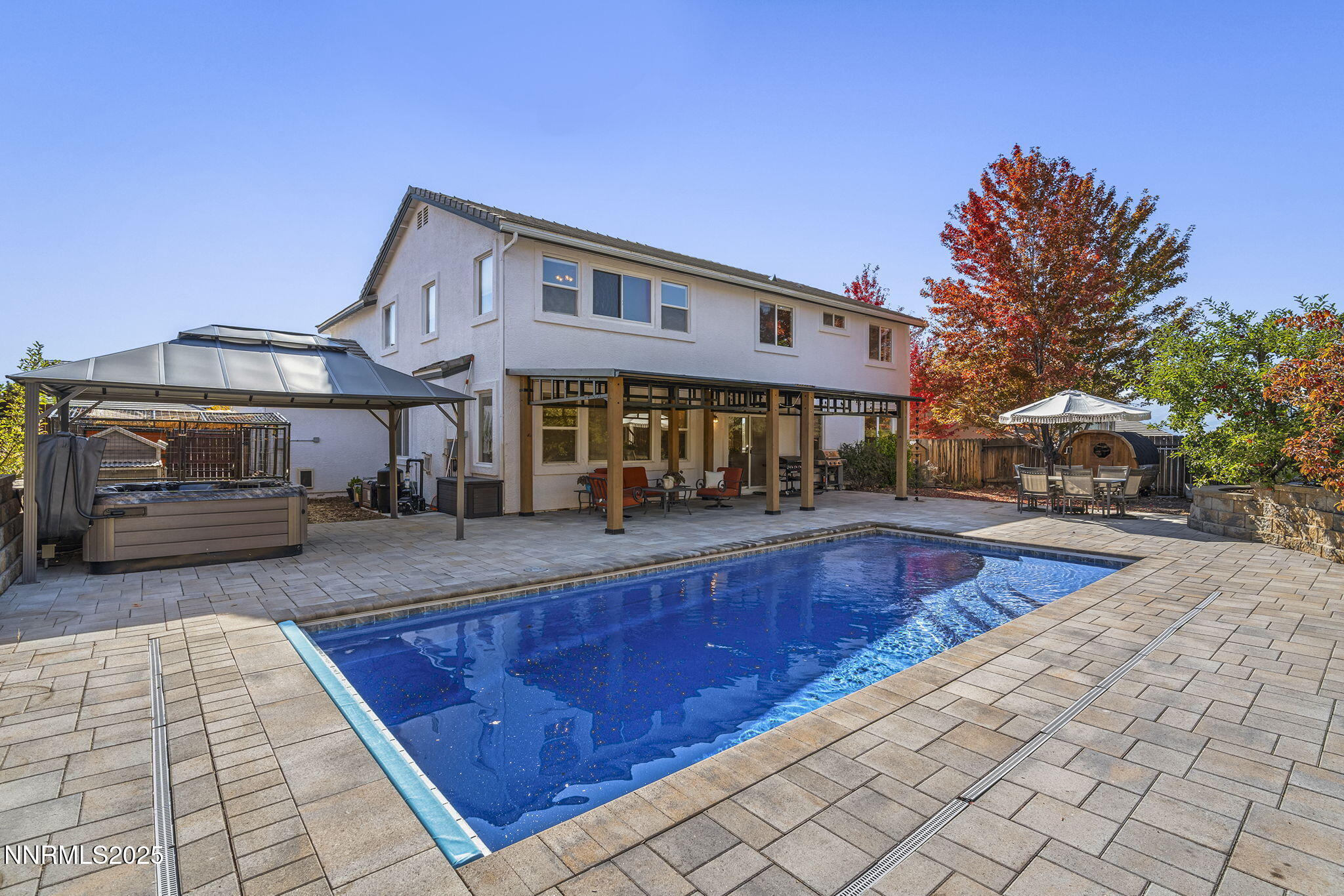7159 Windstar Drive Reno, NV 89523 - Photo 30 of 33 a view of a house with swimming pool and sitting area