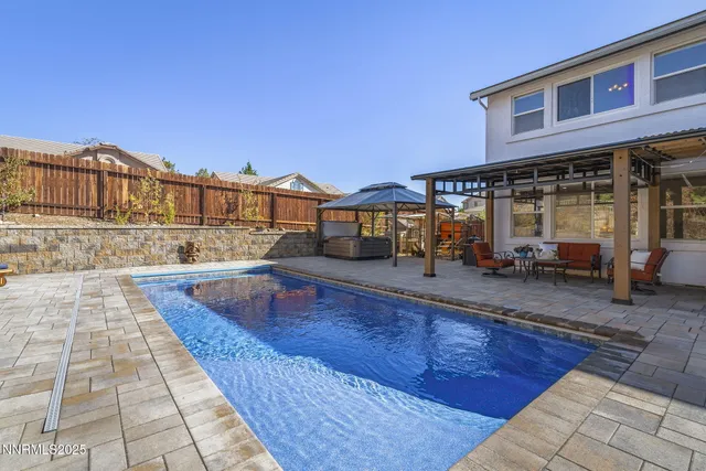 a view of a house with swimming pool