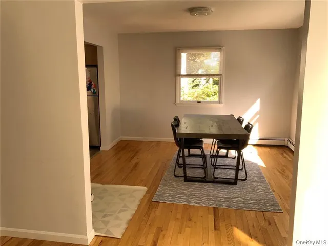 a workspace with furniture and a window