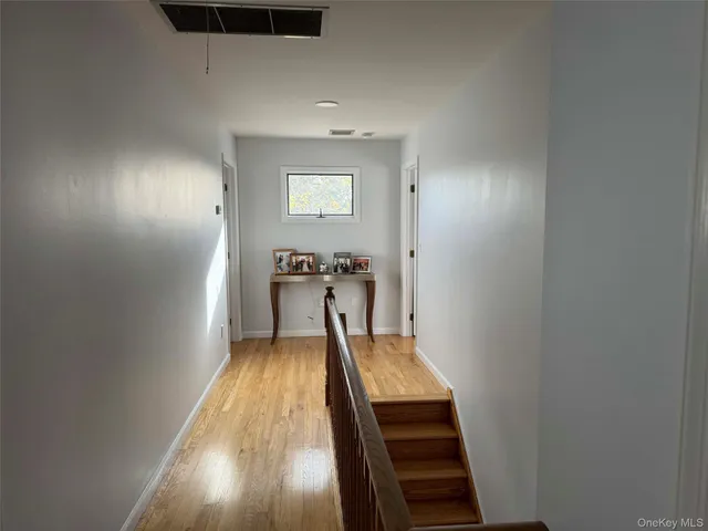 a view of a hallway with entryway