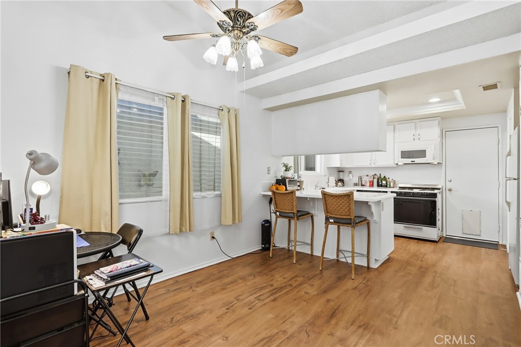 29350 Murrieta Road Menifee, CA 92586 - Photo 11 of 31 a view of a dining room with furniture window and outside view