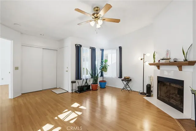 a view of livingroom with furniture and a fireplace