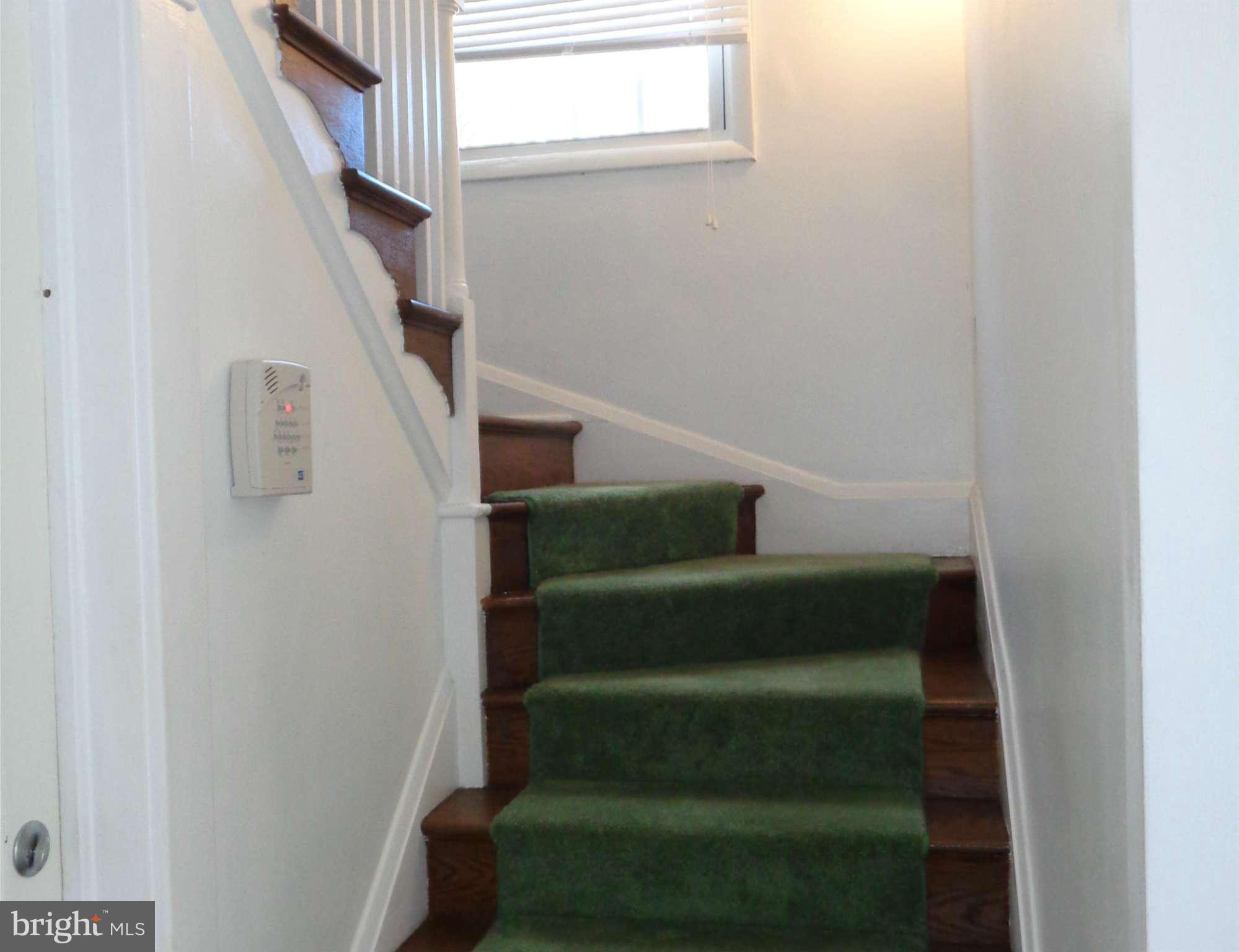 7114 Chambers Road Baltimore, MD 21234 - Photo 11 of 25 NICE OPEN STAIR CASE TO SECOND FLOOR