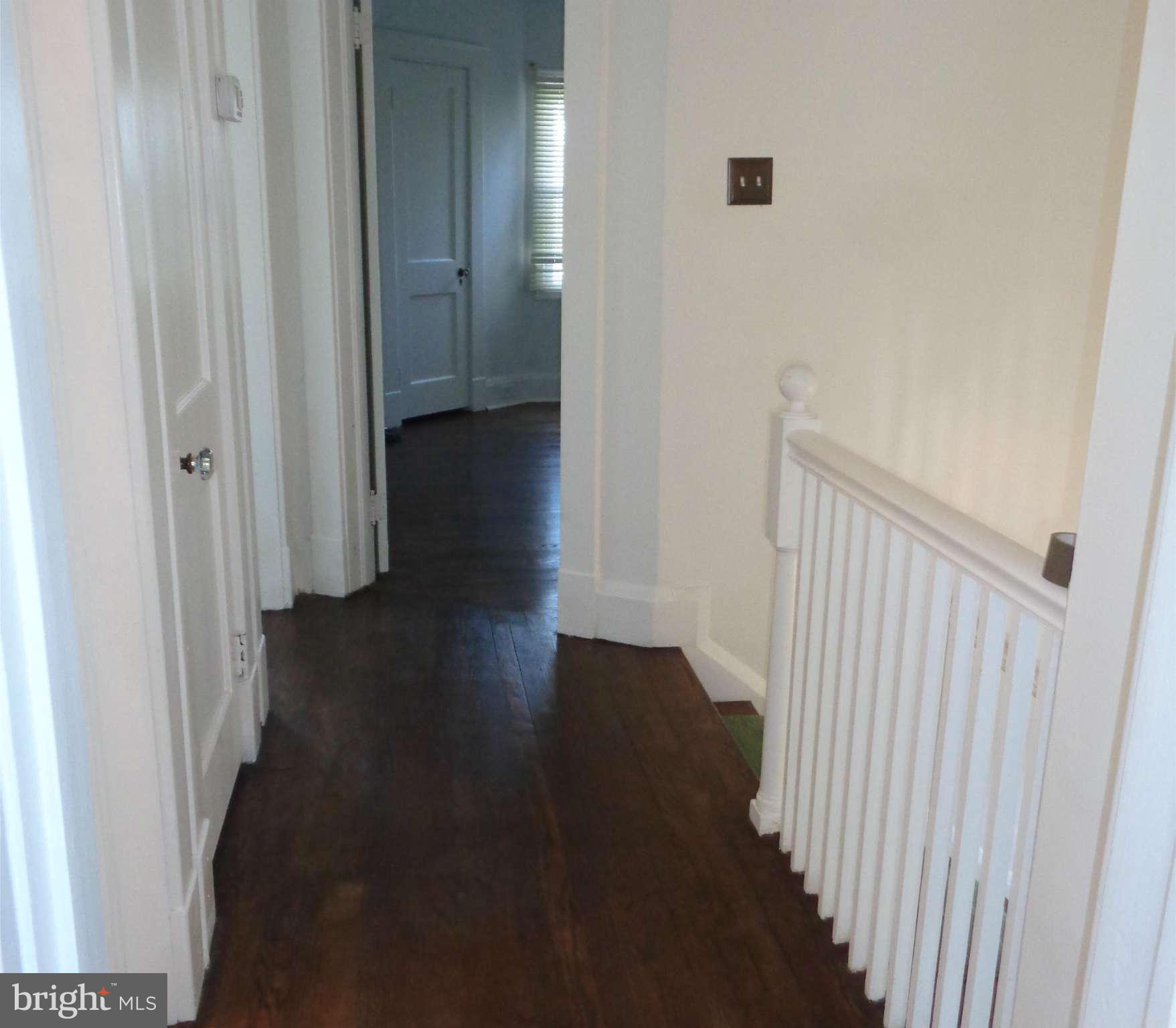 7114 Chambers Road Baltimore, MD 21234 - Photo 12 of 25 HALLWAY TO ALL THREE BEDROOMS