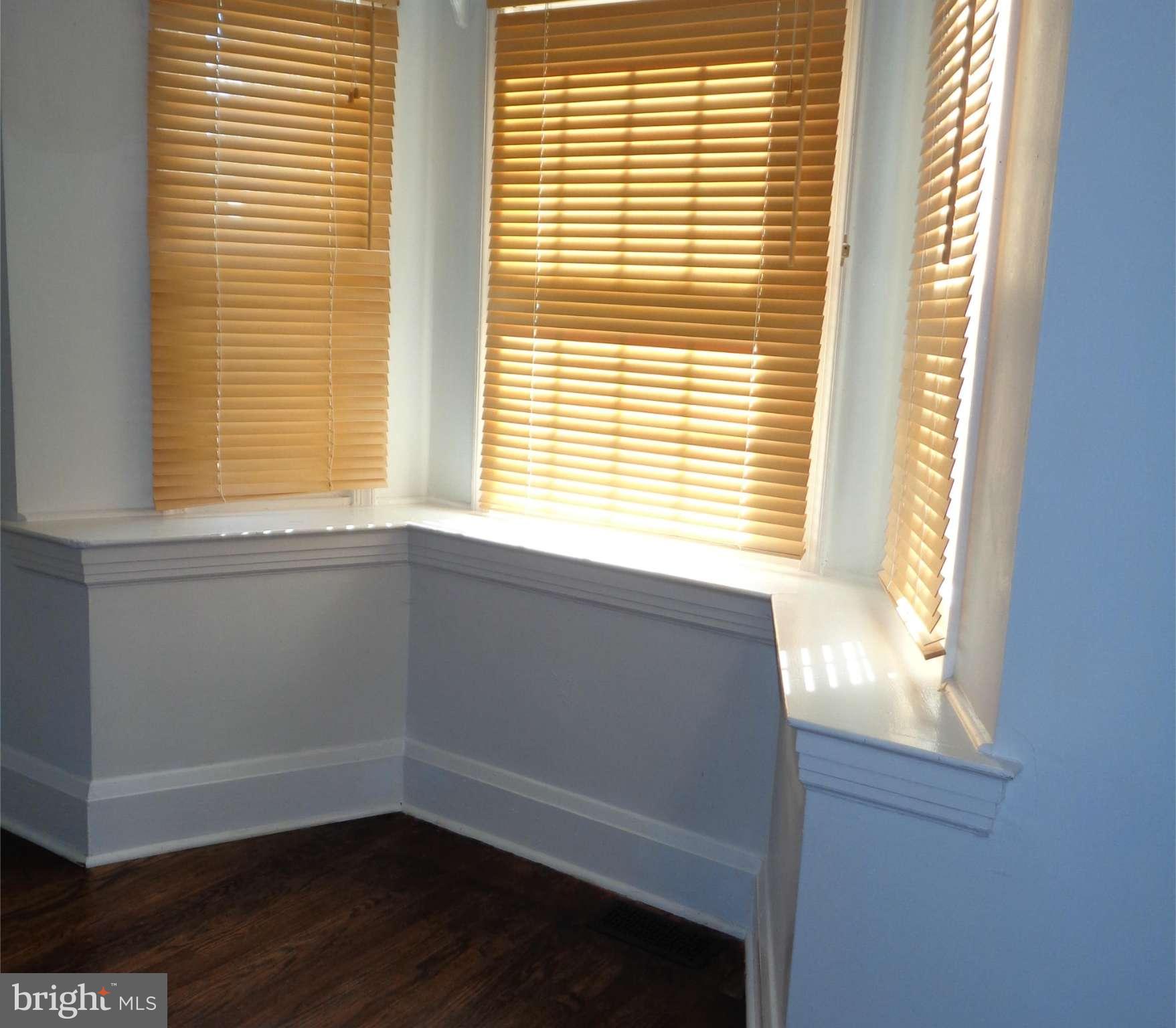 7114 Chambers Road Baltimore, MD 21234 - Photo 5 of 25 IBAY WINDOW IN LIVING ROOM REPLACED WINDOWS