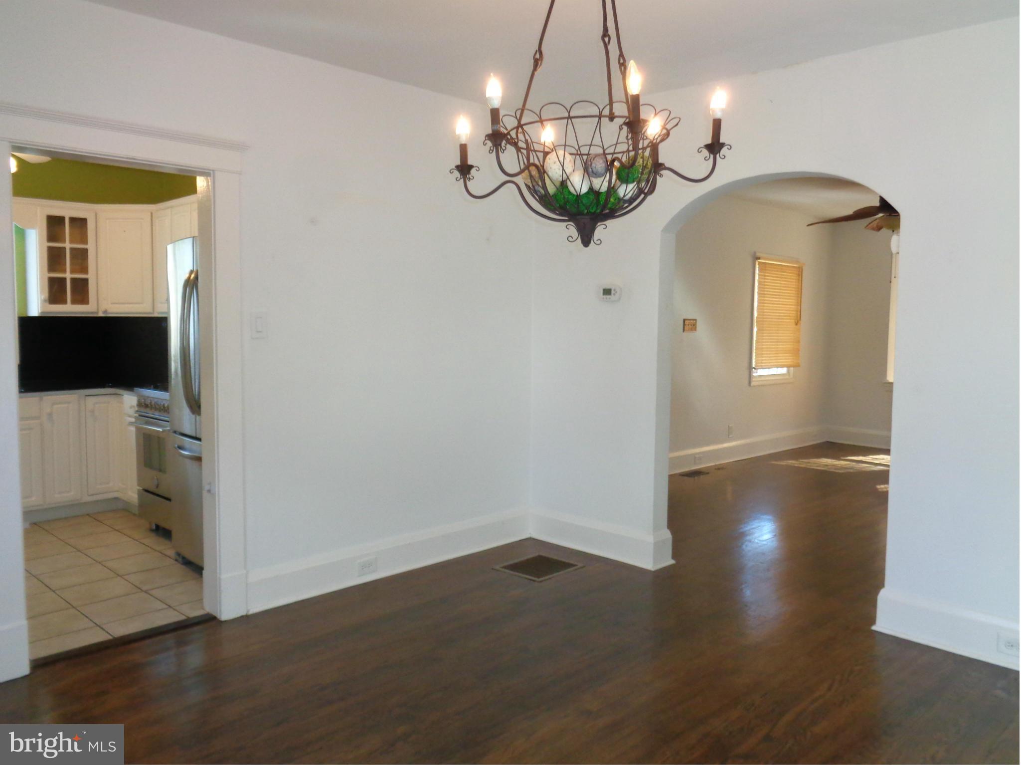 7114 Chambers Road Baltimore, MD 21234 - Photo 6 of 25 VIEW FROM DINING ROOM TO KITCHEN AND LIVING ROOM
