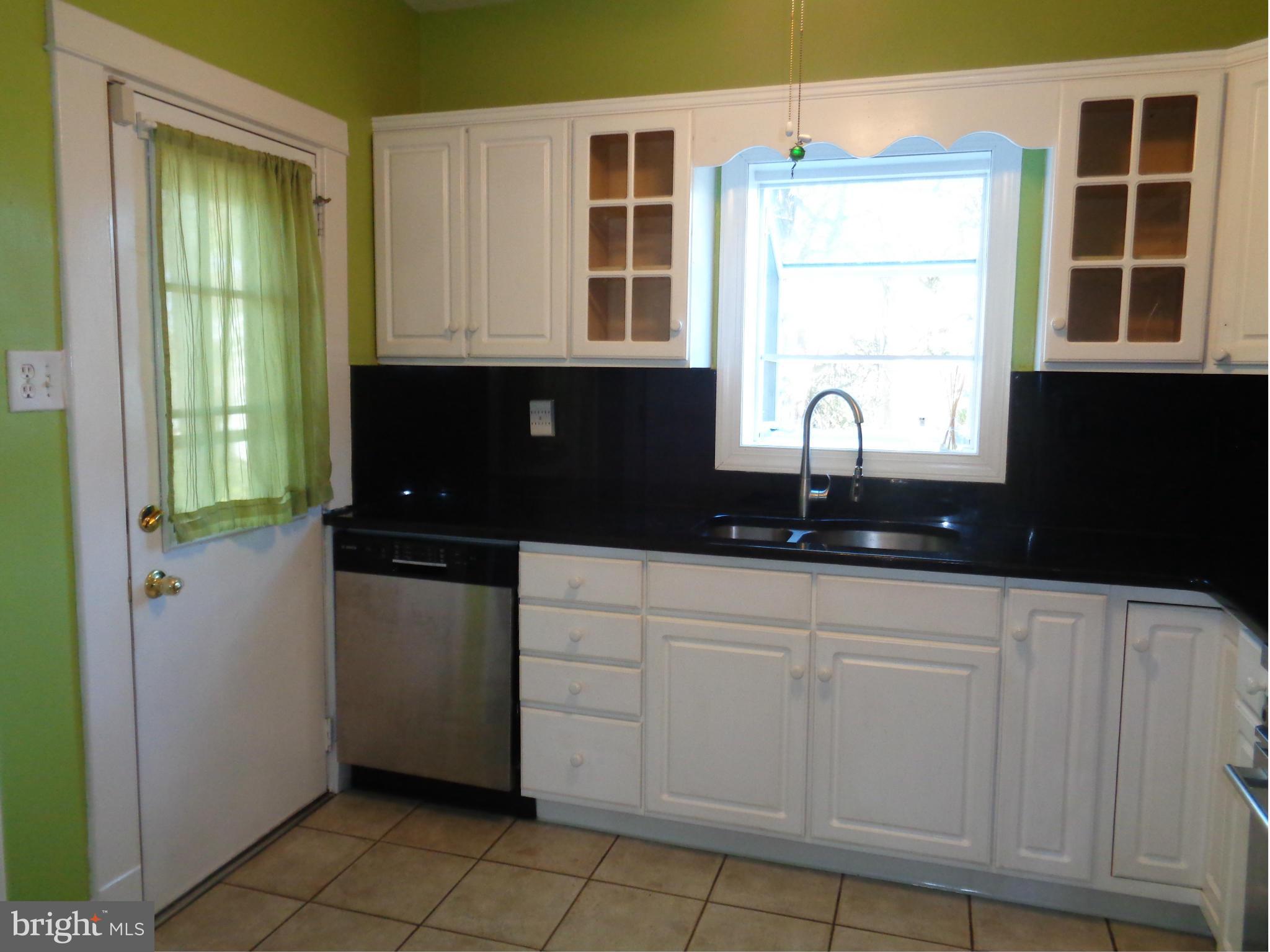 7114 Chambers Road Baltimore, MD 21234 - Photo 8 of 25 EASY ACCESS TO BACK YARD FROM KITCHEN