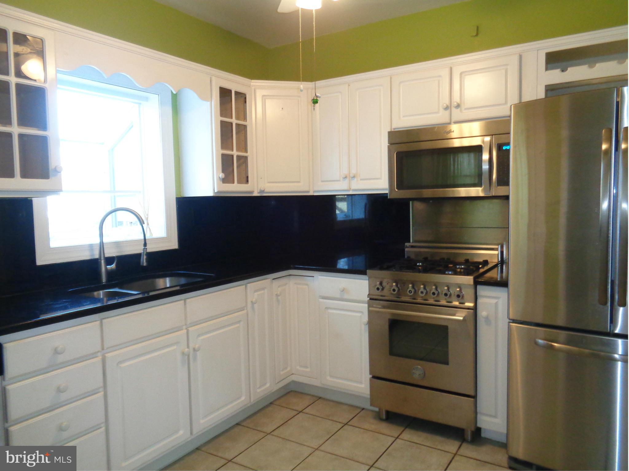7114 Chambers Road Baltimore, MD 21234 - Photo 9 of 25 REMODELED WITH GRANITE AND STAINLESS APPLIANCES