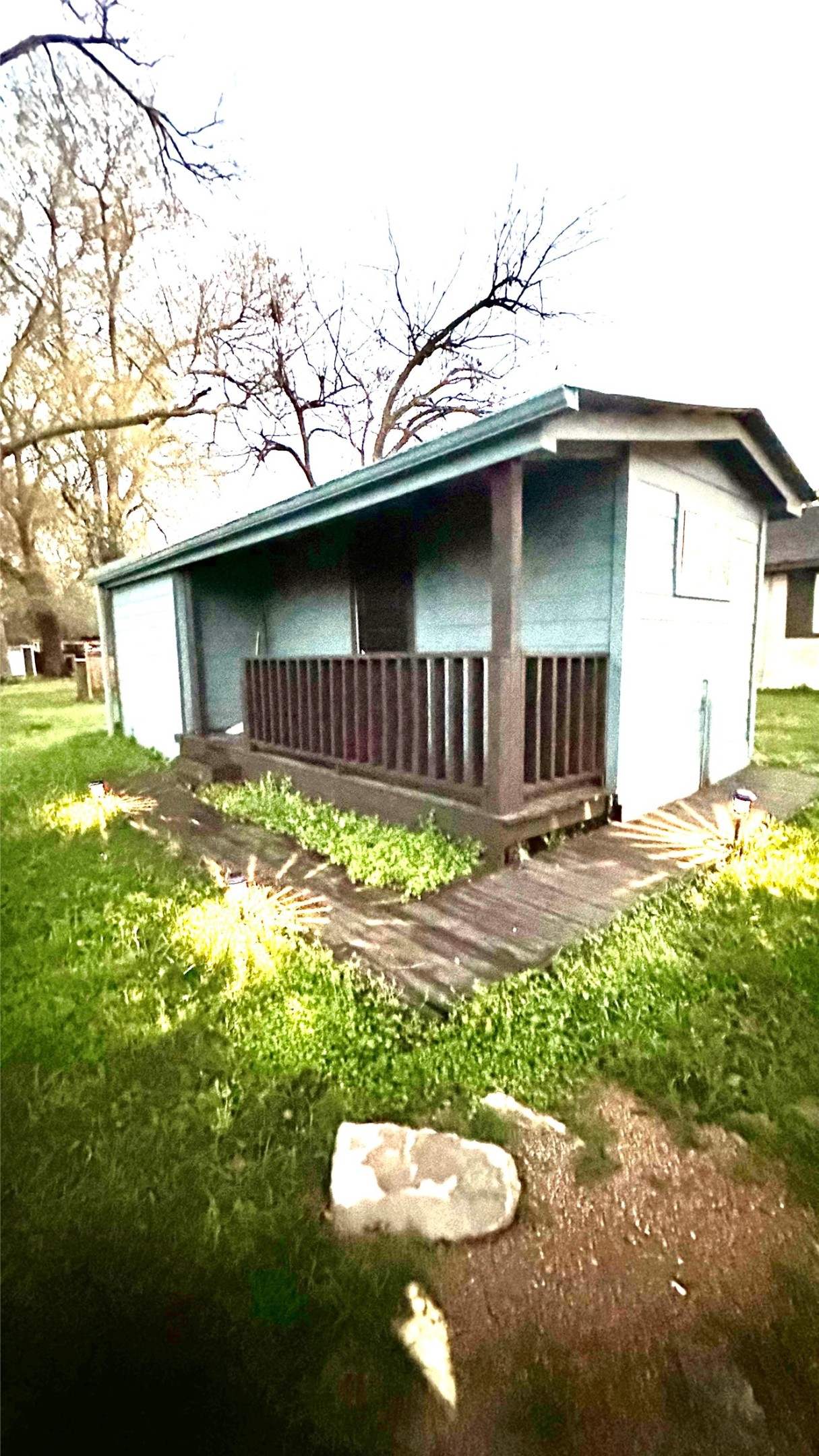 414 Frydek Road Sealy, TX 77474 - Photo 12 of 22 a view of a wooden house with a yard