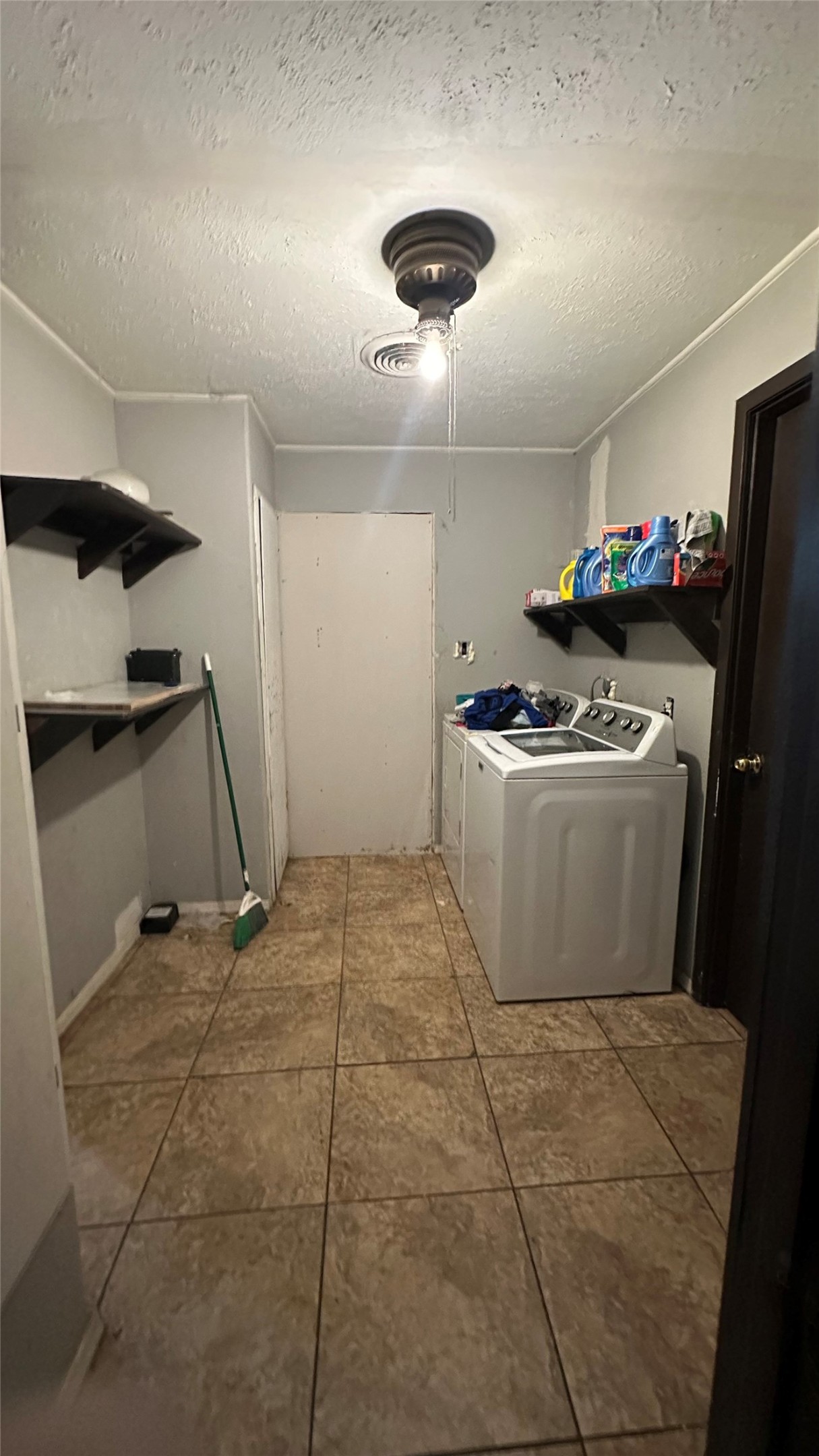 414 Frydek Road Sealy, TX 77474 - Photo 17 of 22 a room with storage and utility