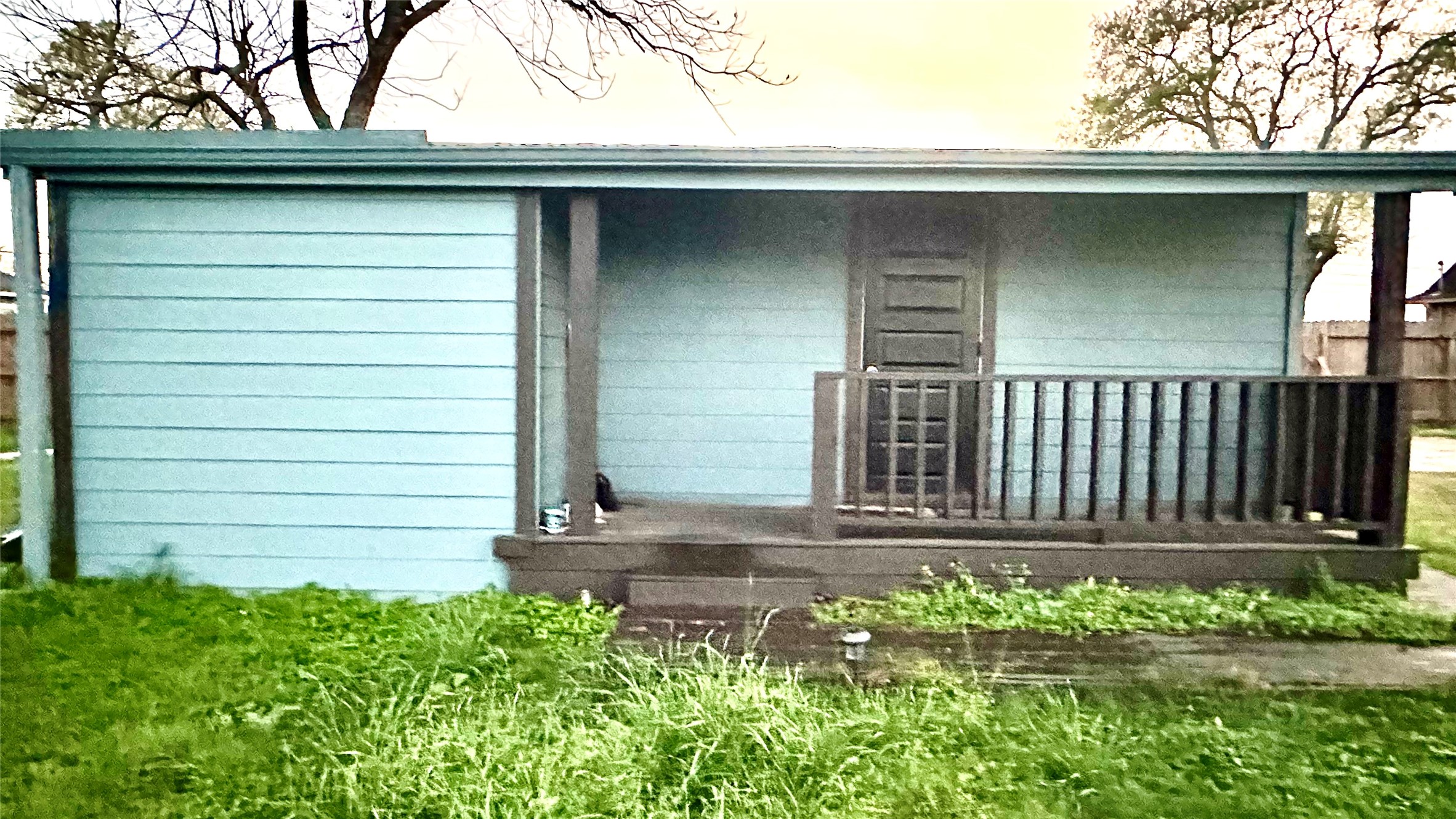 414 Frydek Road Sealy, TX 77474 - Photo 4 of 22 a front view of a house with a garden