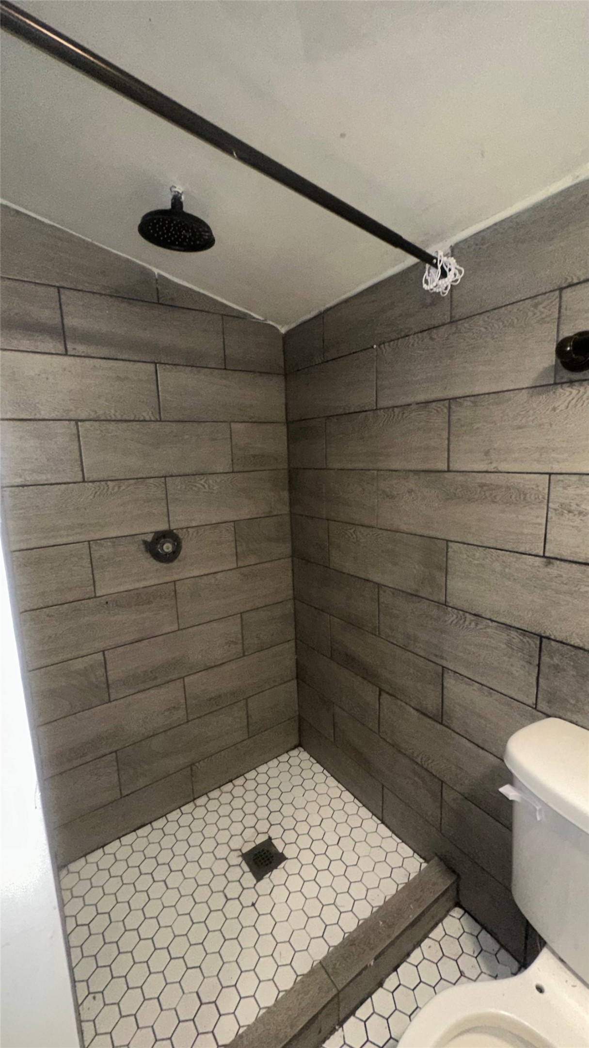 414 Frydek Road Sealy, TX 77474 - Photo 6 of 22 a bathroom with a shower and a toilet