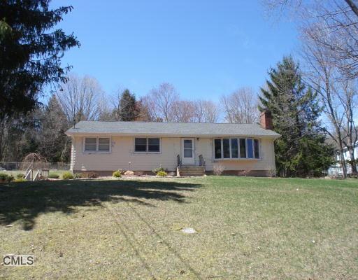 40 Quaker Ridge Road Shelton, CT 06484 - Photo 1 of 1 a front view of a house with a yard