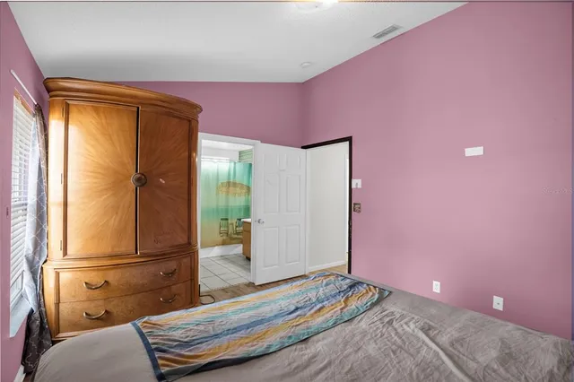 a bathroom with a double vanity sink and mirror