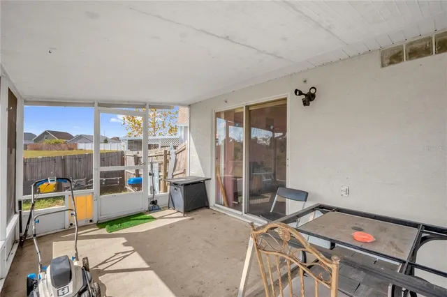 a aerial view of a house with a yard