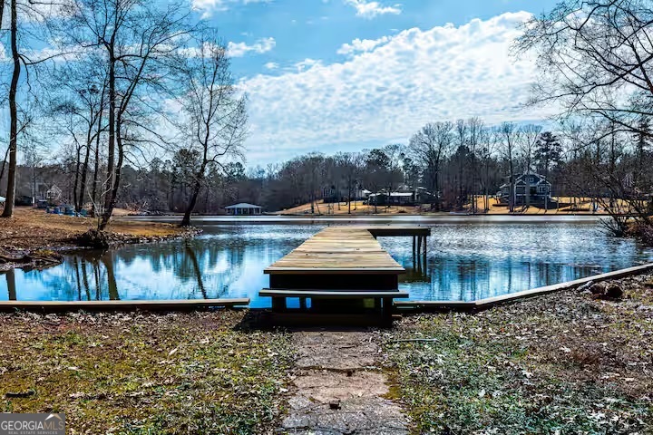 68 Franklin Road Eatonton, GA 31024 - Photo 3 of 28 a view of a swimming pool with a yard