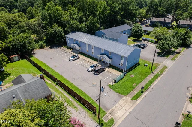 an aerial view of a house with a garden
