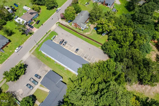 an aerial view of a house with a garden