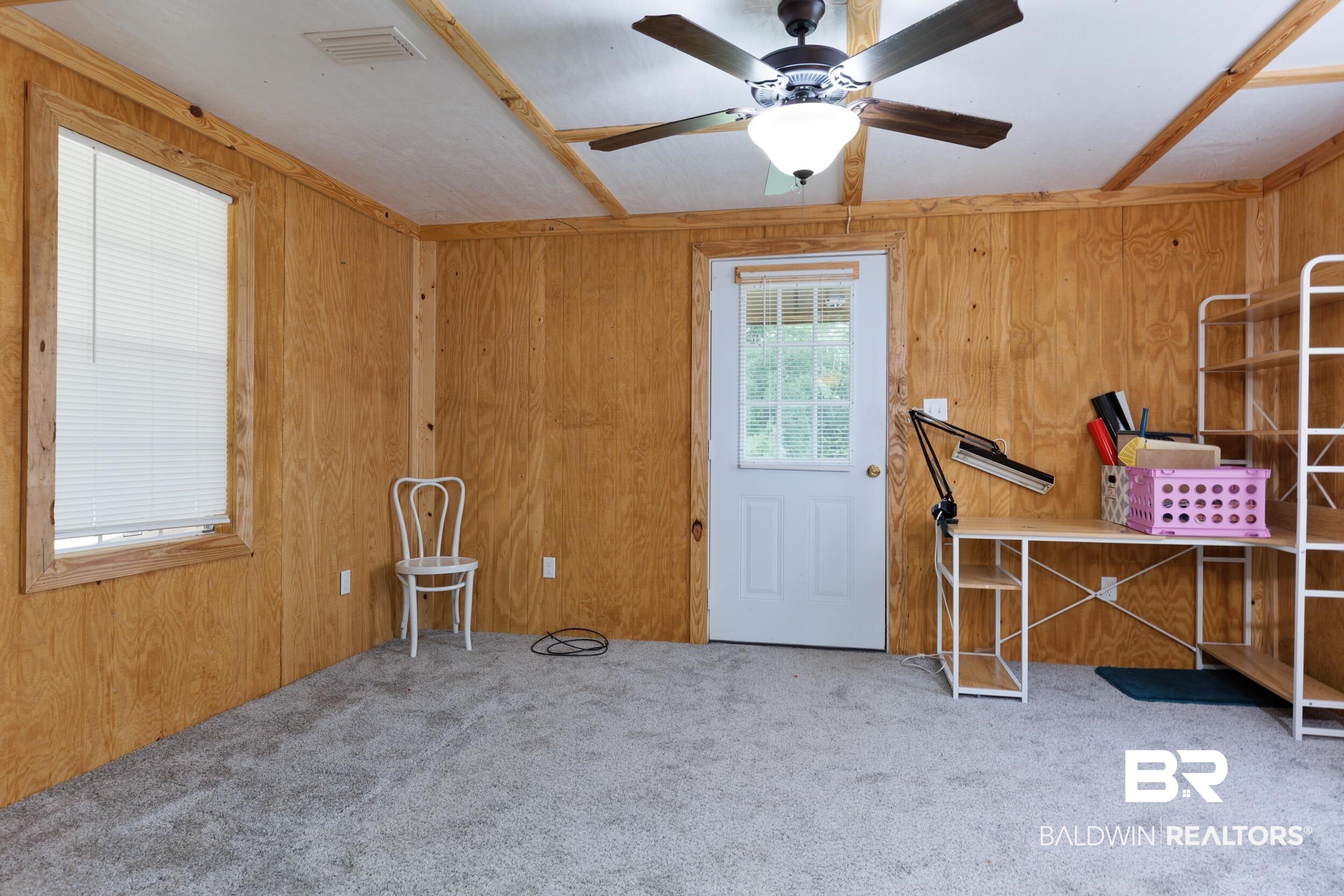 6725 Upper Creek Road Flomaton, AL 36441 - Photo 56 of 61 Miscellaneous room with carpet flooring, wooden walls, and ceiling fan