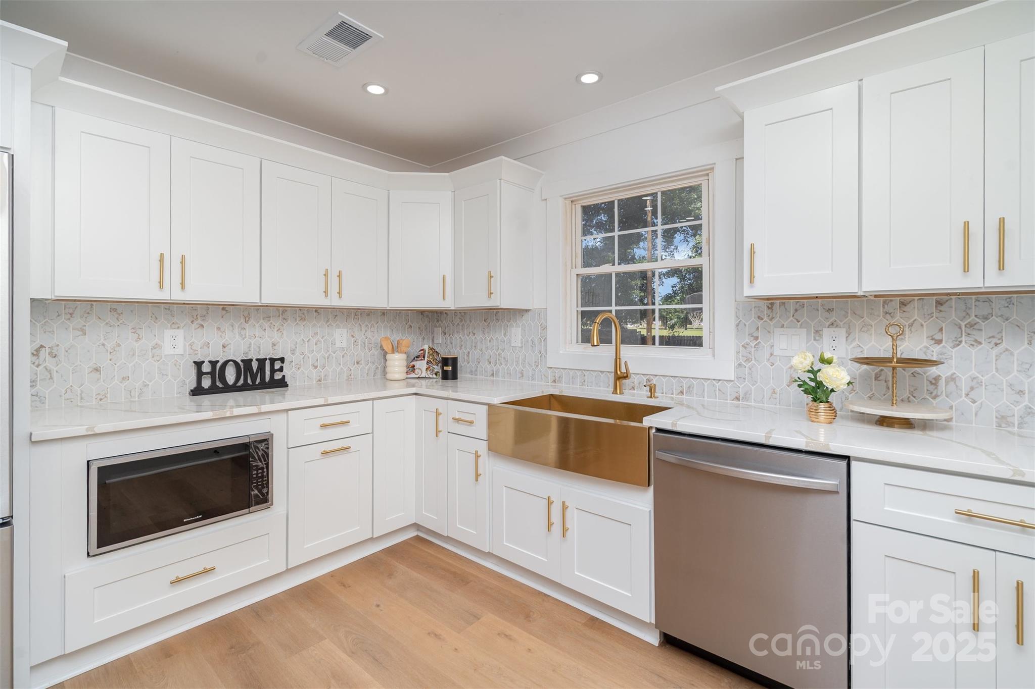 617 Jennings Road, Unit 14 Rock Hill, SC 29730 - Photo 14 of 42 a kitchen with granite countertop white cabinets and white appliances