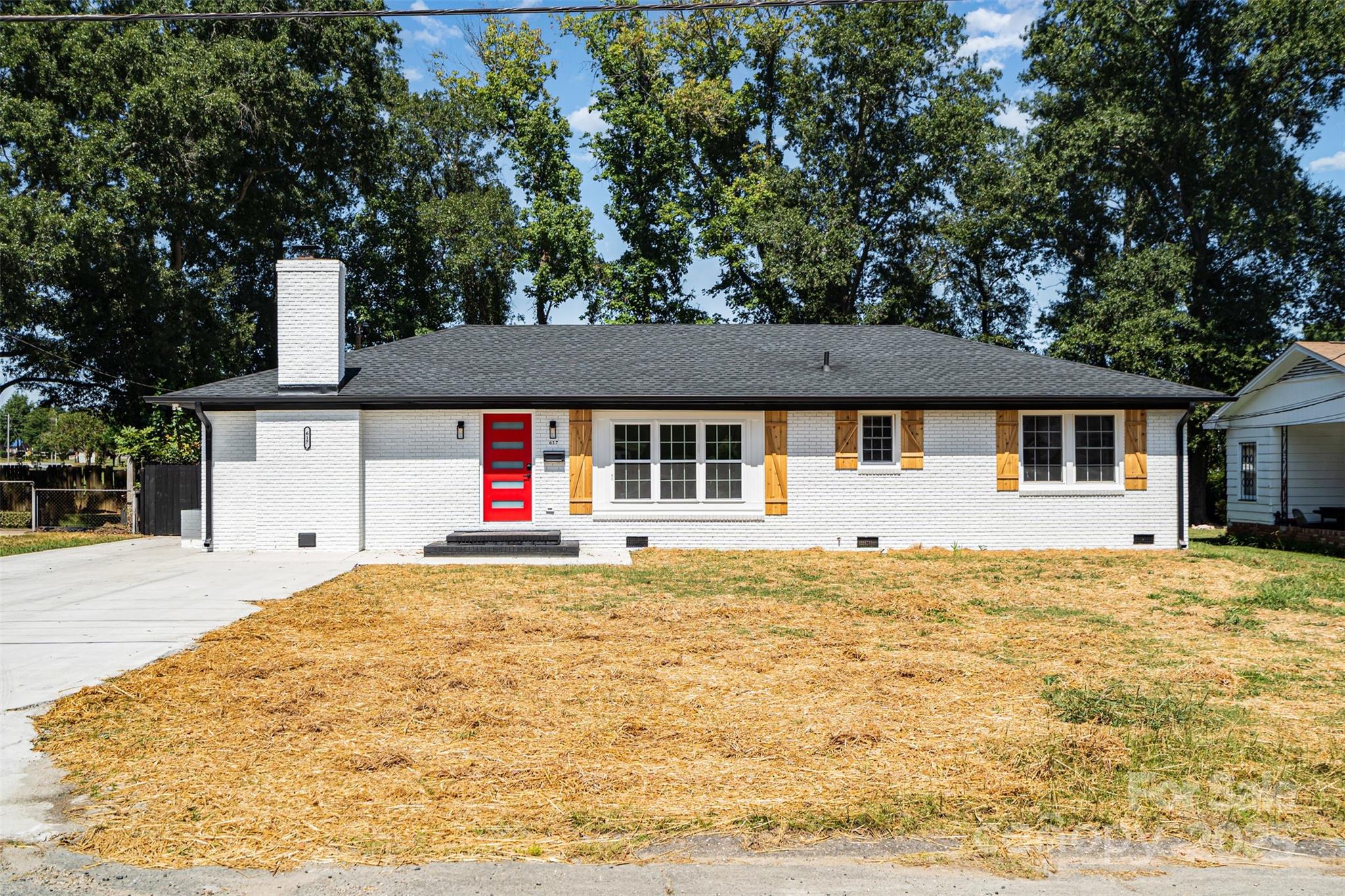 617 Jennings Road, Unit 14 Rock Hill, SC 29730 - Photo 2 of 42 a house with trees in the background