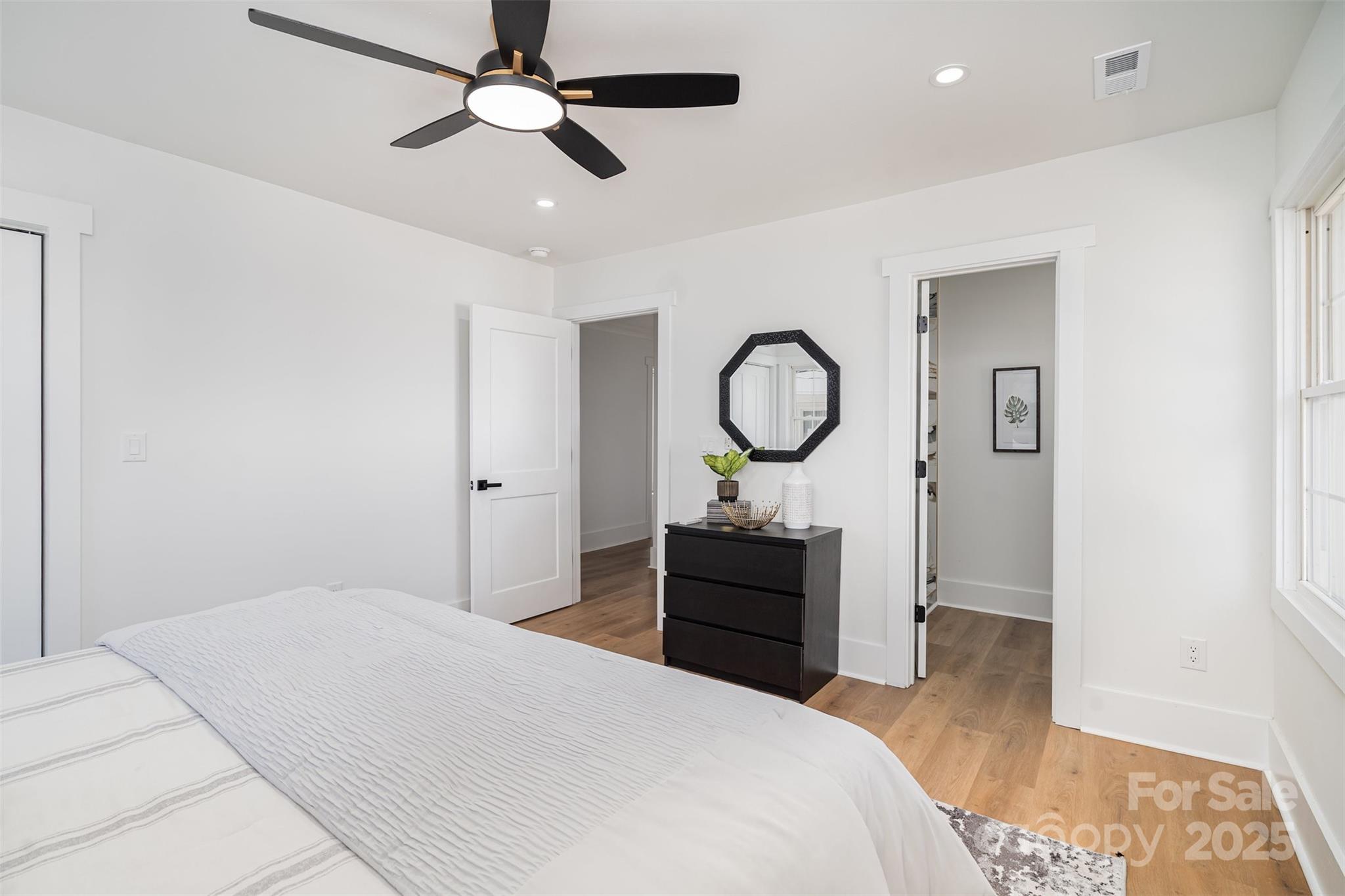 617 Jennings Road, Unit 14 Rock Hill, SC 29730 - Photo 23 of 42 a bedroom with a bed and wooden floor