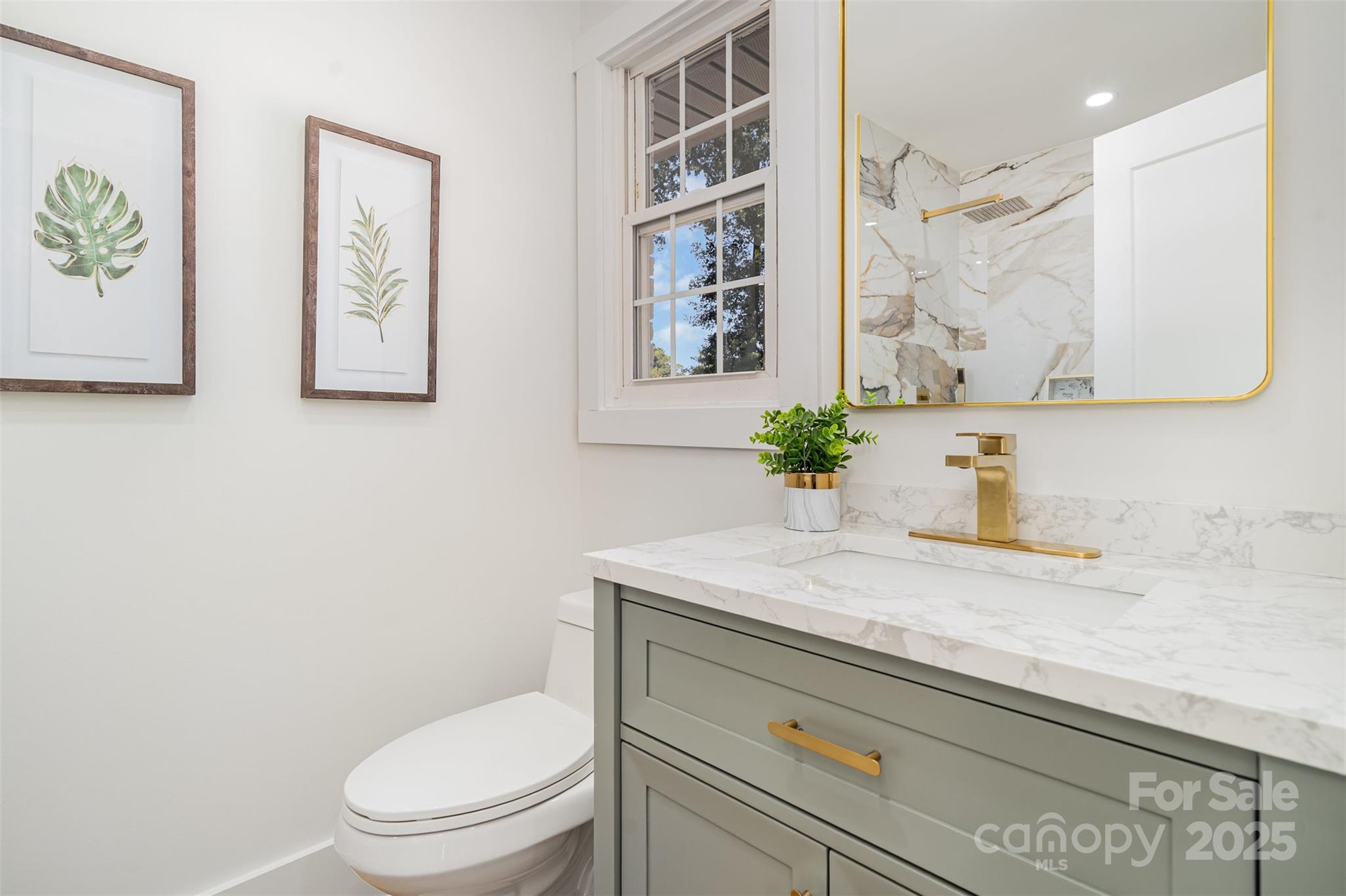 617 Jennings Road, Unit 14 Rock Hill, SC 29730 - Photo 24 of 42 a bathroom with a granite countertop sink a toilet and a mirror