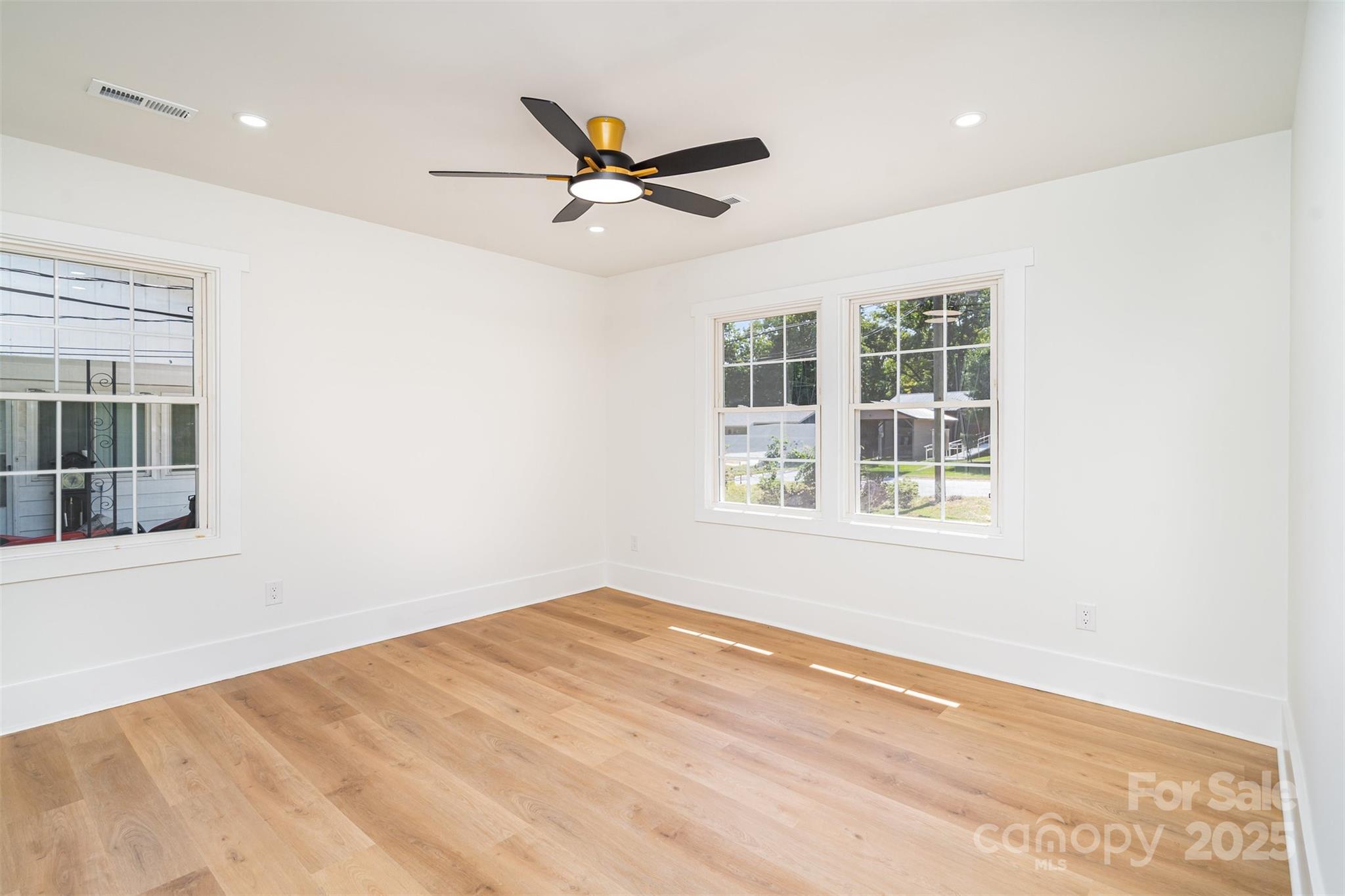 617 Jennings Road, Unit 14 Rock Hill, SC 29730 - Photo 26 of 42 a view of a big room with windows and ceiling fan