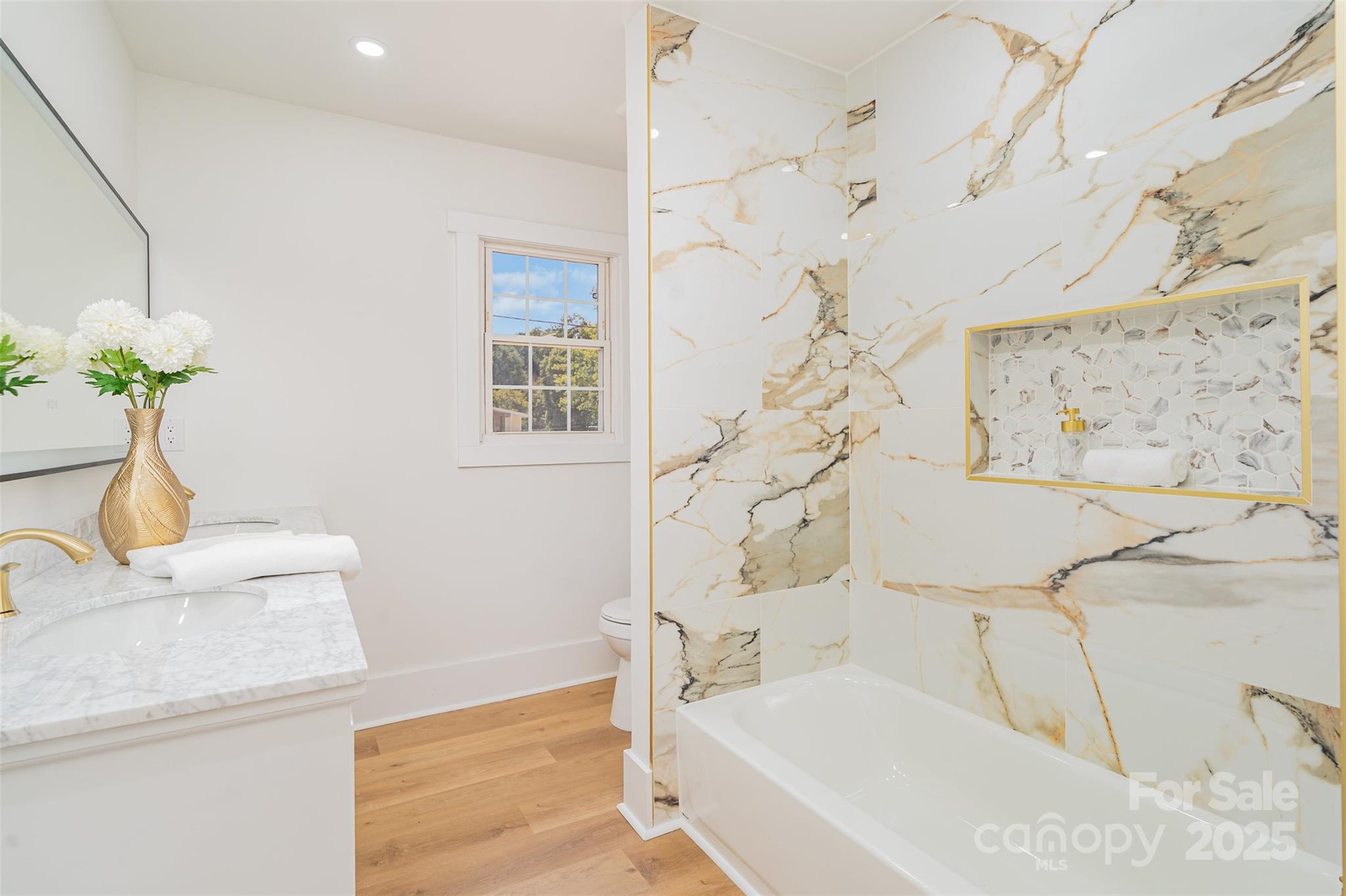 617 Jennings Road, Unit 14 Rock Hill, SC 29730 - Photo 28 of 42 a bath tub sitting next to a white sink