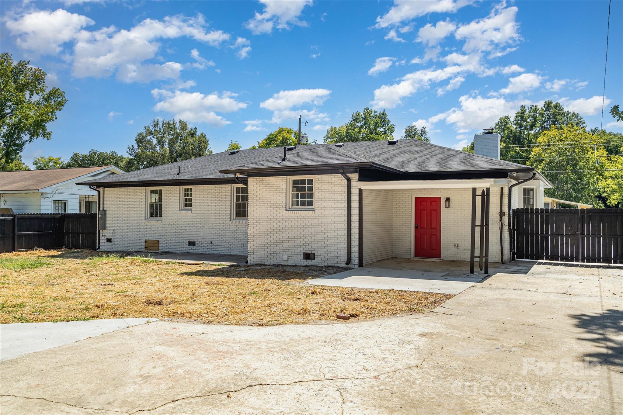 617 Jennings Road, Unit 14 Rock Hill, SC 29730 - Photo 33 of 42 a front view of a house with a covered space and balcony